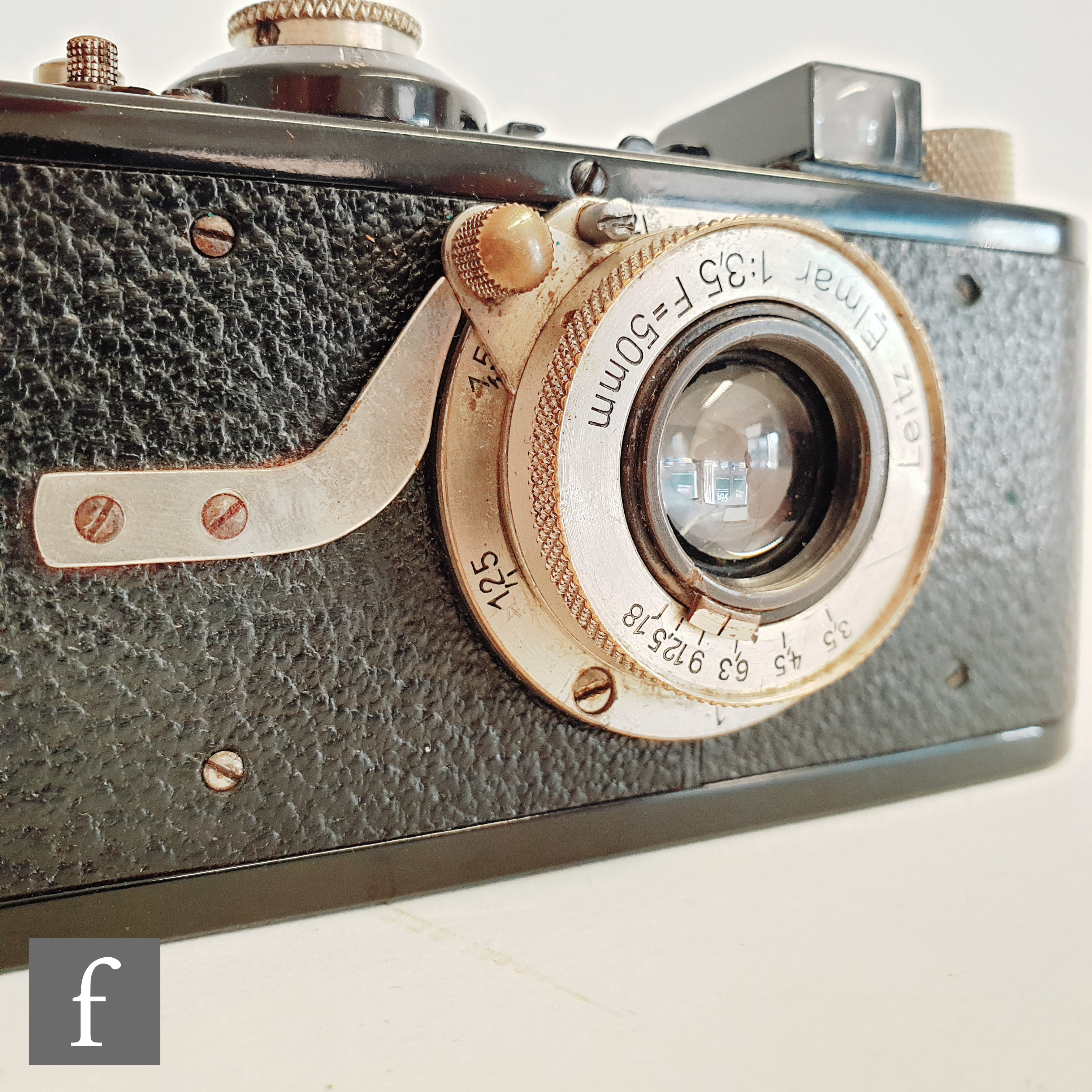 A Leica I (model A) camera, circa 1930, serial number 22149, the black body with black lacquered - Image 12 of 12