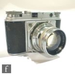 A Voigtländer Prominent 35mm rangefinder camera, serial number B3654, with Nokton 1:1.5/50mm lens,
