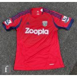 A Romelu Lukaku match worn shirt for West Bromwich Albion No 20, red and blue, logo Zoopla. On the