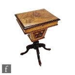 A Victorian figured walnut work table with plush lined interior on associated tripod legs, width