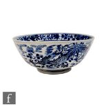 A Chinese blue and white bowl, Kangxi four-character mark to base, the exterior sides depicting a