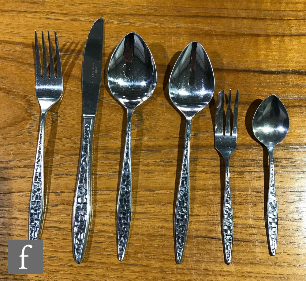 A 1960s six place setting canteen of Mosaic pattern stainless steel cutlery, designed by Gerald