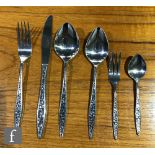 A 1960s six place setting canteen of Mosaic pattern stainless steel cutlery, designed by Gerald