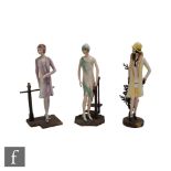 Three Albany China models of Art Deco ladies stood on bronzed metal bases, stamped Albany