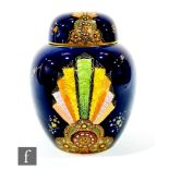A 1930s Art Deco Carlton Ware Fan pattern ginger jar and cover decorated with a gilt and enamelled