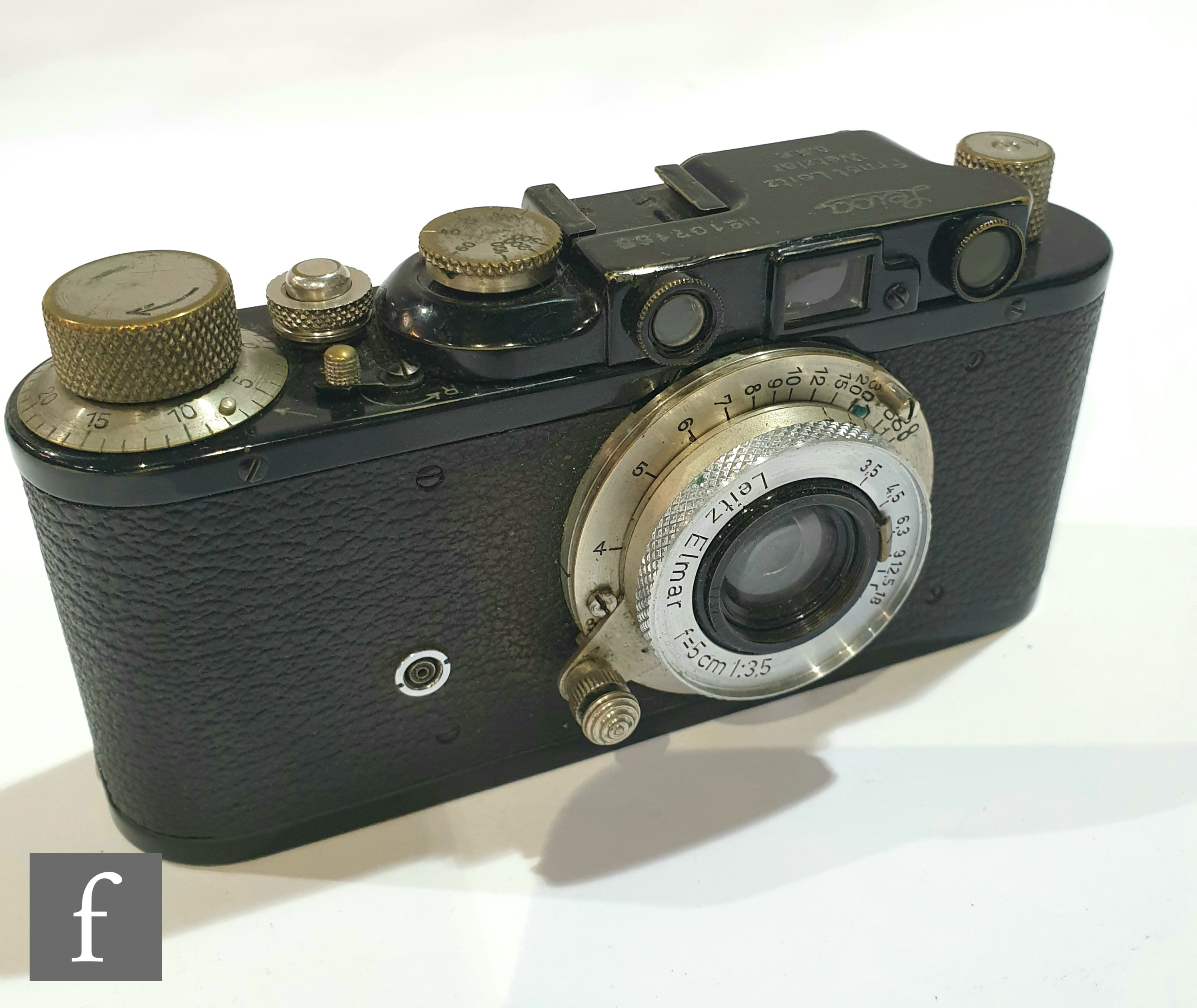 A Leica II rangefinder camera, circa 1933, black case, serial number 107155, with Leitz Elmar f=