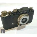 A Leica II rangefinder camera, circa 1933, black case, serial number 107155, with Leitz Elmar f=