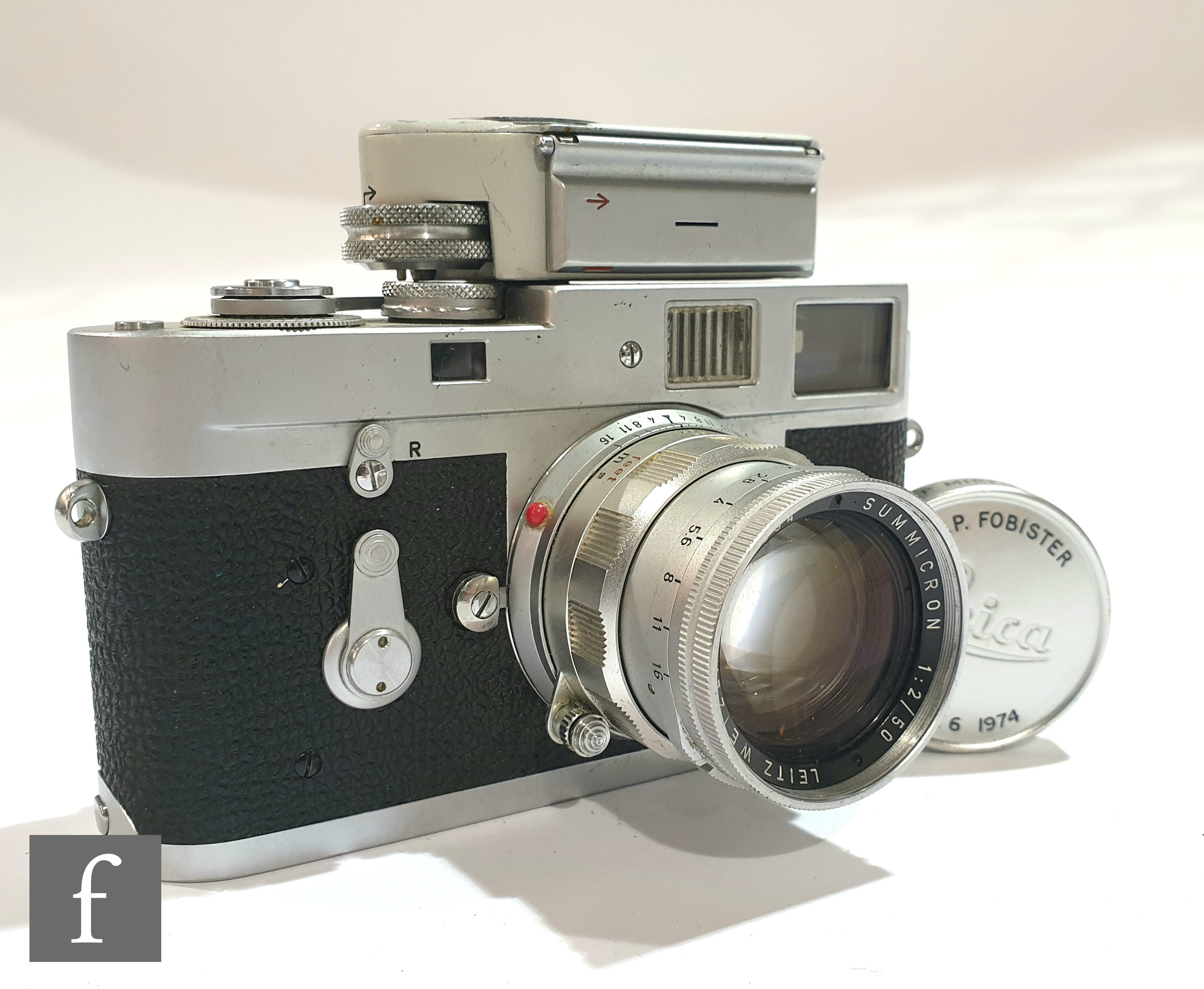 A Leica M2 rangefinder camera, circa 1960, serial number 982140, chrome body, with fitted M2