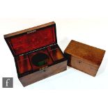 A 19th Century mahogany rectangular tea caddy fitted with two separate canisters but lacking glass