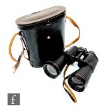 A pair of Liebermann and Gortz 12 x 65 binoculars, marked Field 4 degrees No 74919, cased.