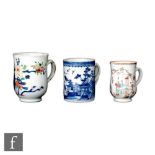 A collection of three Chinese Qianlong (1736-95) period export porcelain tankards, to include two