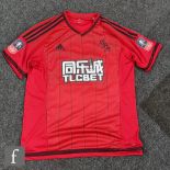 A Victor Chinedu Anichebe match worn West Bromwich Albion shirt No 10, red and black, Adidas logo,