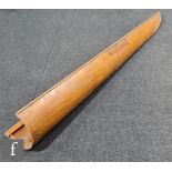 A 20th Century ribbed half model section of a rowing boat, named Defiance, length 236cm.