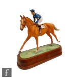 A Royal Worcester equestrian model of Grundy and Pat Eddery modelled by Doris Lindner, numbered