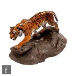 A large Royal Doulton model of a tiger on a rock HN2639, printed mark, length 40cm, height 29cm.