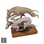 An Albany Fine China model titled Greyhounds modelled by Neil Campbell, the two racing dogs with