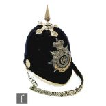 A late 19th Century officer's blue cloth helmet for the South Wales Borderers 4th Volunteer