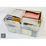 A large quantity of 1970s and later presentation stamp packs, loose stamps, modern proof coins,