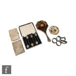 A parcel lot of assorted hallmarked silver items to include two cigarette cases, five napkin