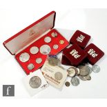 A 1974 Commonwealth of the Bahamas nine coin silver, nickel and brass set, also five George V half