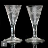 A near pair of 18th Century gin glasses circa 1740, each with a drawn trumpet bowl engraved with