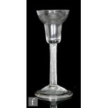 An 18th Century wine glass circa 1750, the pan topped bowl above a multi series air twist stem and