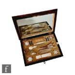A 19th Century Palais Royal sewing box fitted with mother of pearl tools to include scissors,