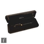 A boxed Parker Duofold fountain pen in black with 23k gold plated trim, the medium nib stamped 18k