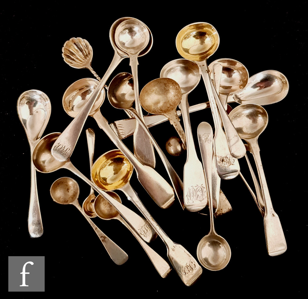 Twenty three assorted Georgian and later salt, mustard and condiment spoons to include fiddle and