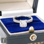 A platinum set diamond solitaire ring, claw set asher cut stone, weight 1.70ct, colour J/K,