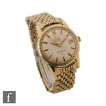 A gentleman's gold plated Omega Constellation Calendar automatic wrist watch, batons to a cream