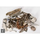 A parcel lot of assorted hallmarked silver and white metal and other items to include Albert chains,