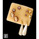 Five pairs of assorted earrings to include a two pairs of ruby and diamond and cameo stud