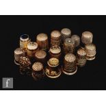 Eighteen assorted silver and hallmarked silver thimbles of varying size to include an example with