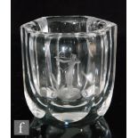 A small Orrefors clear crystal glass vase of hexagonal form with slice cut panels, one engraved with