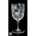 A 19th Century small Masonic goblet, the round funnel bowl engraved with masonic emblems above a