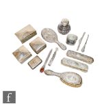 A parcel lot of hallmarked silver items to included three cigarette boxes, a set of four hair