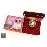 A Queen Elizabeth The Queen Mother Centenary Gold Proof Crown, complete with inner and outer boxes