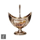 A hallmarked silver and enamelled decorated boat shaped pedestal sugar basin, detailed with an
