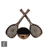 A silver hallmarked pin cushion modelled as crossed tennis rackets with central cushion,