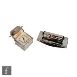 An Art Deco chromium plated combination desk clock and calendar of square form, height 8.5cm and