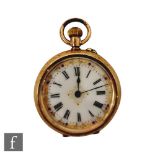 A 14ct crown wind open faced fob watch, Roman numerals to a white enamelled dial, diameter of case