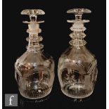 A pair of early 19th Century Waterford clear crystal glass decanters circa 1820, the Prussian form