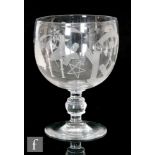 A 19th Century Masonic goblet, engraved with masonic emblems above a knopped stem to a circular