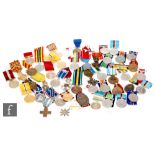 A parcel lot of assorted medals, British and Foreign to include an Arnham 50th Anniversary, Woman'