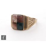 A gentleman's 9ct ring, the rectangular head set with four various agate stones to triangular