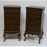A pair of Georgian style four drawer Chests, with moulded tops and fretwork,