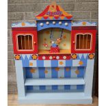 A Children's painted wooden Bookshelf, modelled as a circus.
