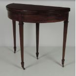 An attractive Edwardian inlaid mahogany demi-lune fold-over Card Table,
