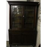 A Nelson period mahogany two door Bureau Bookcase, with bobbin turned cornice,